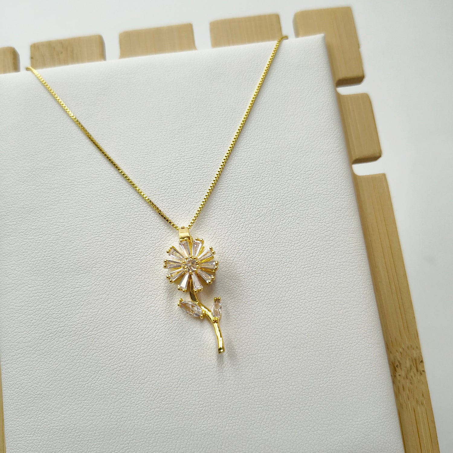 Conjunto Girasol Giratorio  - Baño de Oro 18Kt