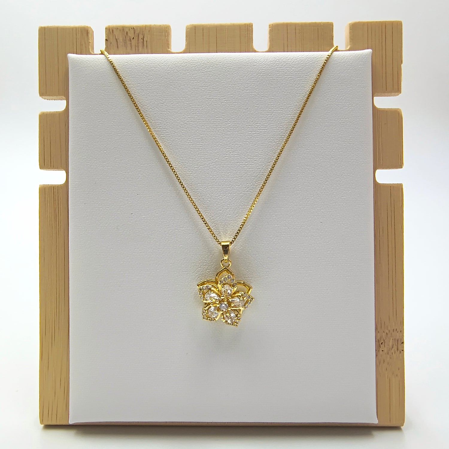 Conjunto Flor Giratoria  - Baño de Oro 18Kt