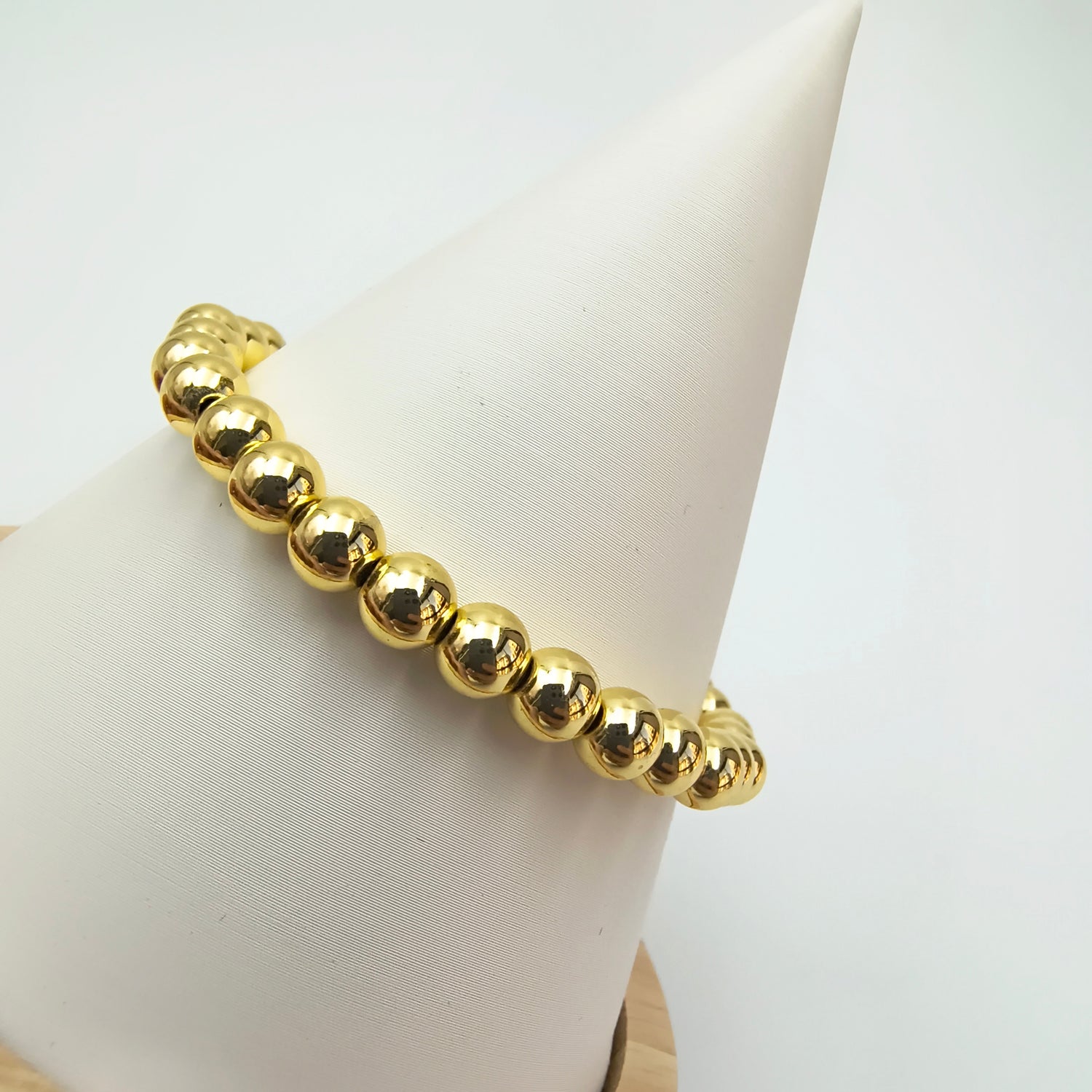 Pulsera Esferas Elasticada Medianas - Baño de Oro 18Kt