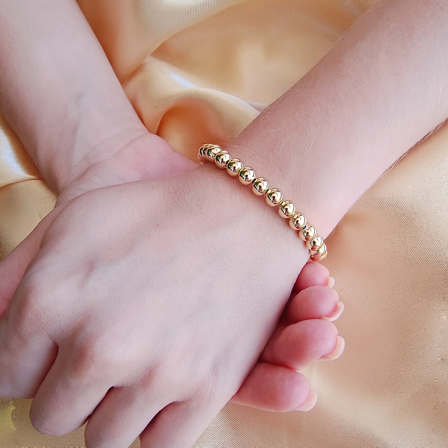 Pulsera Esferas Medianas - Baño de Oro 18Kt